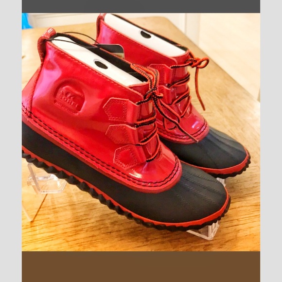 Sorel Shoes - FIRM. Sorel Out and About rain booties.